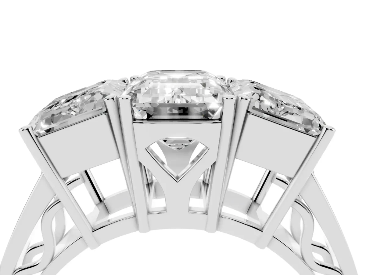 Emerald Cut Diamond Three-Stone Ring with Prong Setting and Textured Band White gold