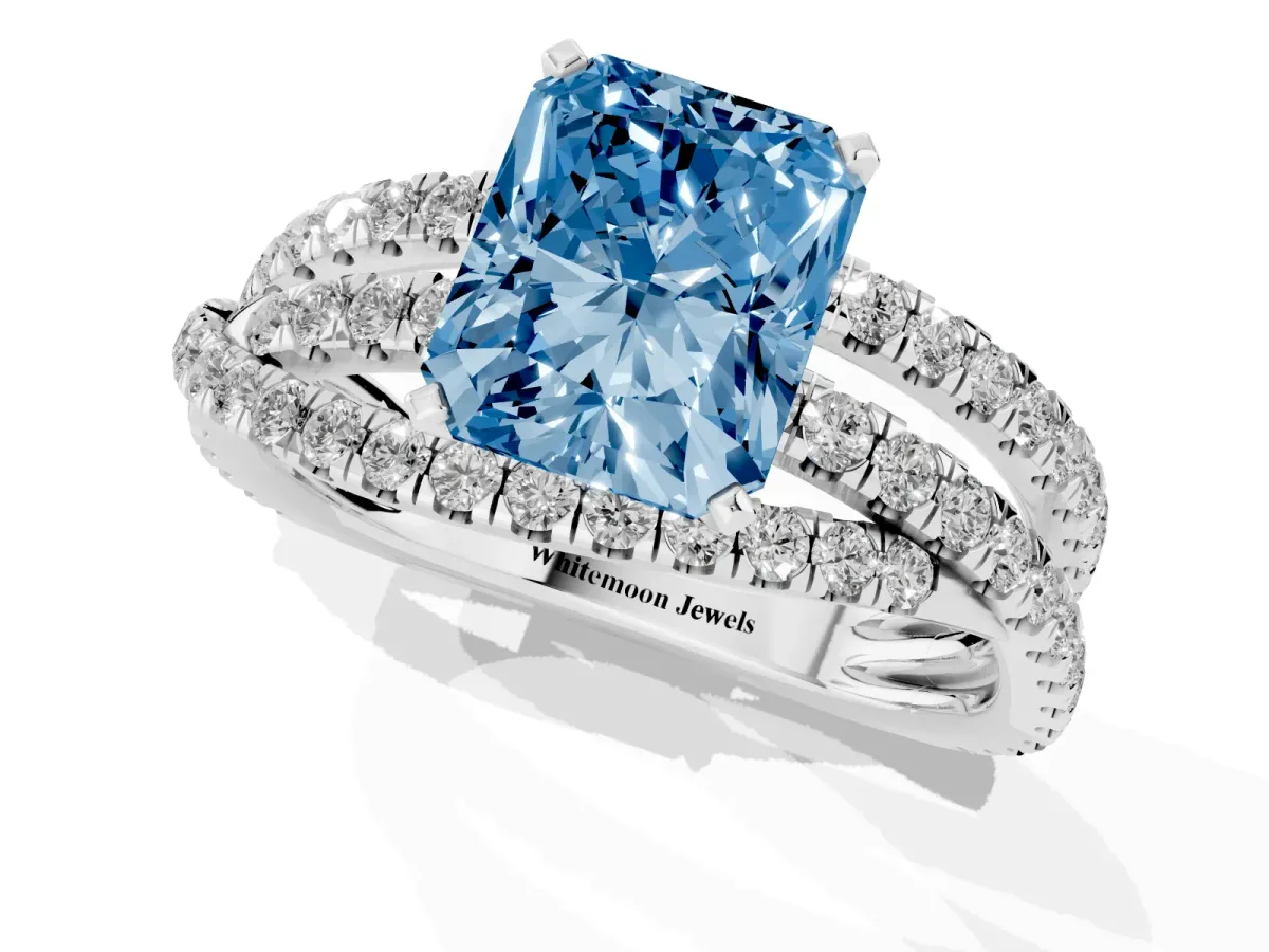 Fancy Blue Radiant Cut Solitaire Twist Band with Pavé Setting and Four-Prong Setting Silver