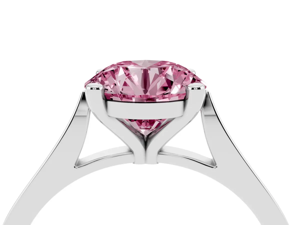 Fancy Pink Round Cut Solitaire Diamond Ring with Four-Prong Setting and Tapered Band Platinum