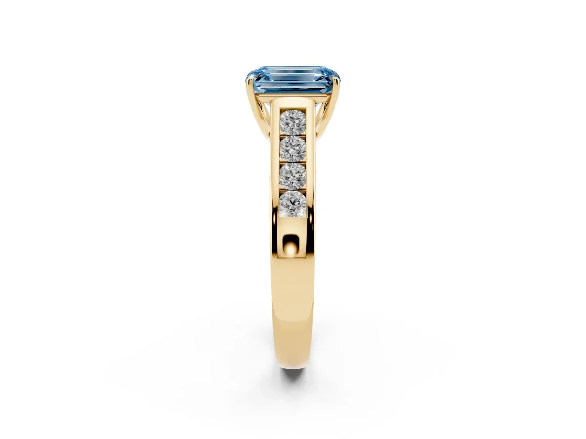Fancy Blue Emerald Cut Solitaire Channel-Set Diamond Engagement Ring with Four-Prong Setting Yellow gold