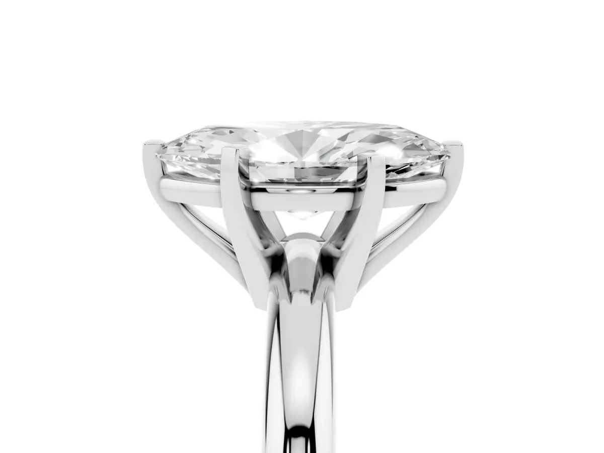 Marquise Cut Diamond Solitaire Engagement Ring with Round Band and Four-Prong Setting Platinum