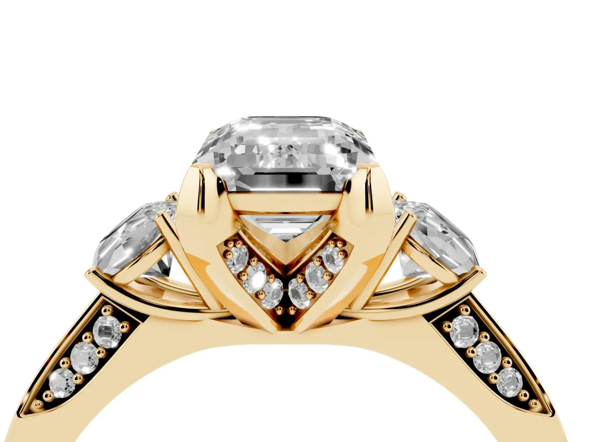 Fancy Pink Emerald Cut Brilliant Three-Stone Diamond Ring with Pavé Band and Four-Prong Setting Yellow gold