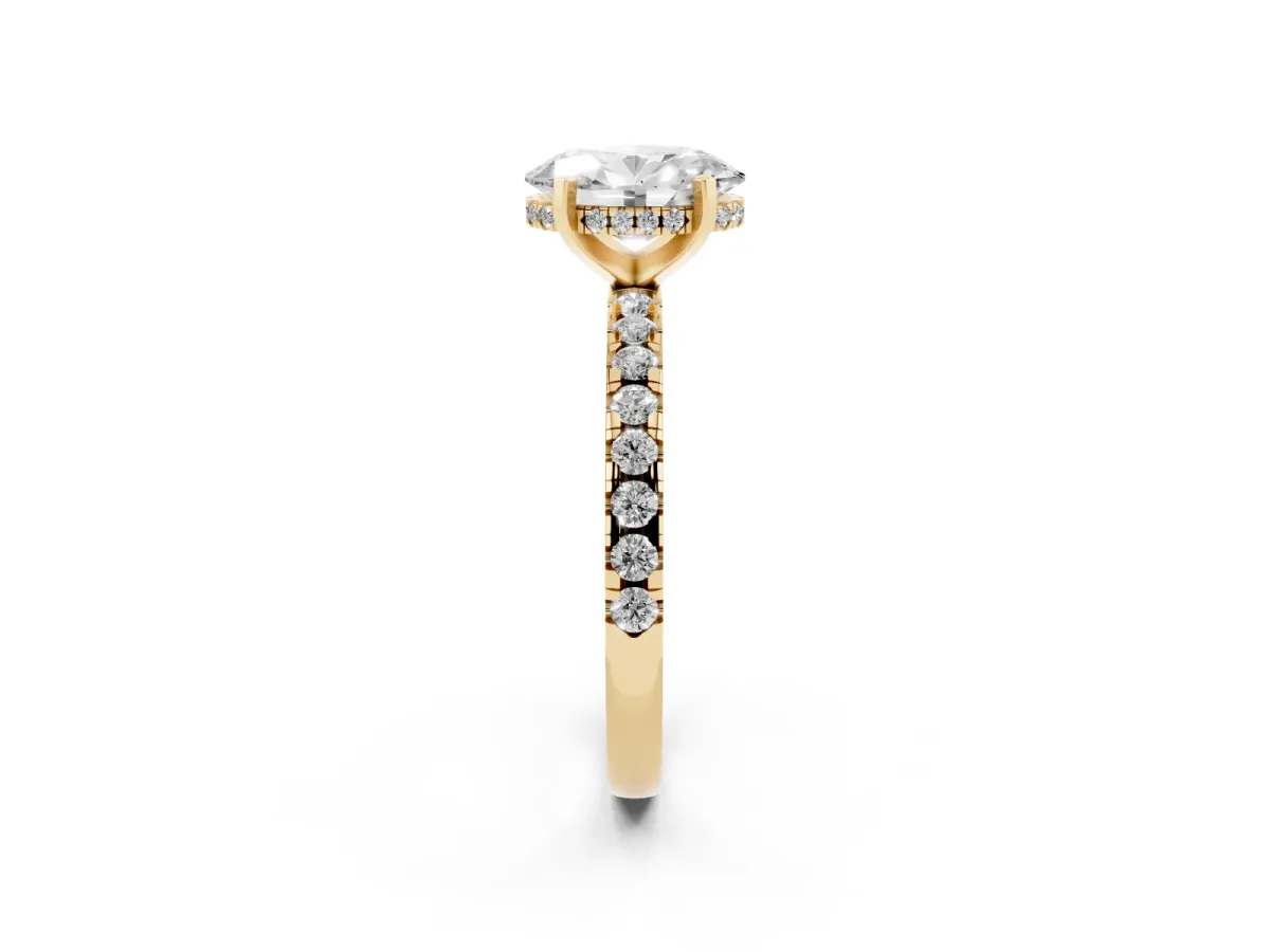 Oval Cut Diamond Solitaire Ring with Round Pavé Band and Four-Prong Setting Yellow gold