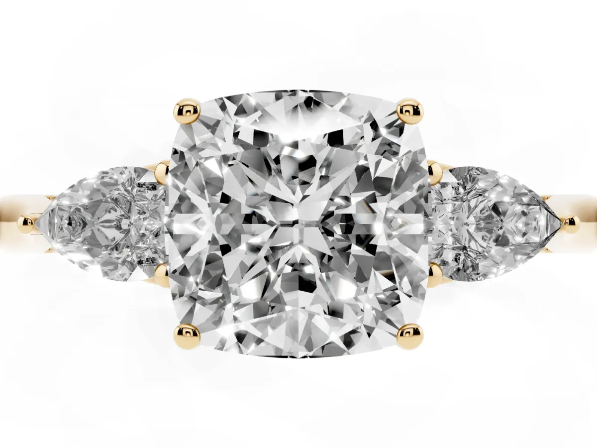 Three-Stone Cushion Cut Brilliant Diamond Solitaire Ring with Tapered Band and Four-Prong Setting Yellow gold
