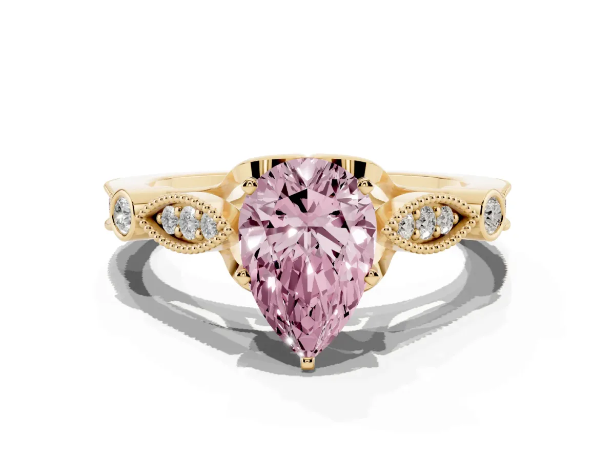Fancy Pink Pear Cut Cut Diamond with Milgrain Marquise and Bezel Accents on a Solitaire Band with Prong Setting Yellow gold