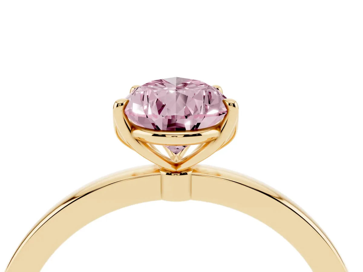 Fancy Pink Pear Cut Diamond Solitaire Ring with Thin Band and Prong Setting Yellow gold