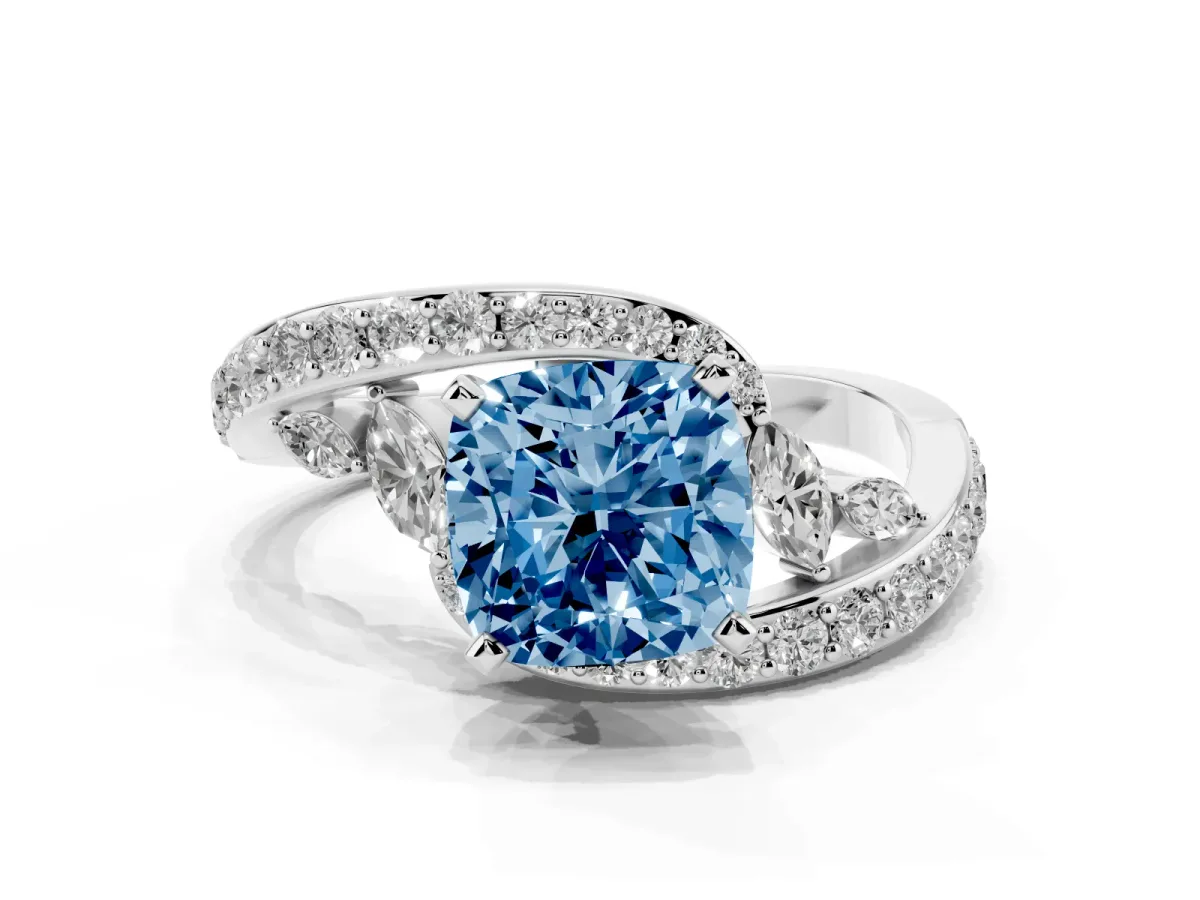 Fancy Blue Cushion Cut Solitaire with Pavé Twist Band and Four-Prong Setting Silver