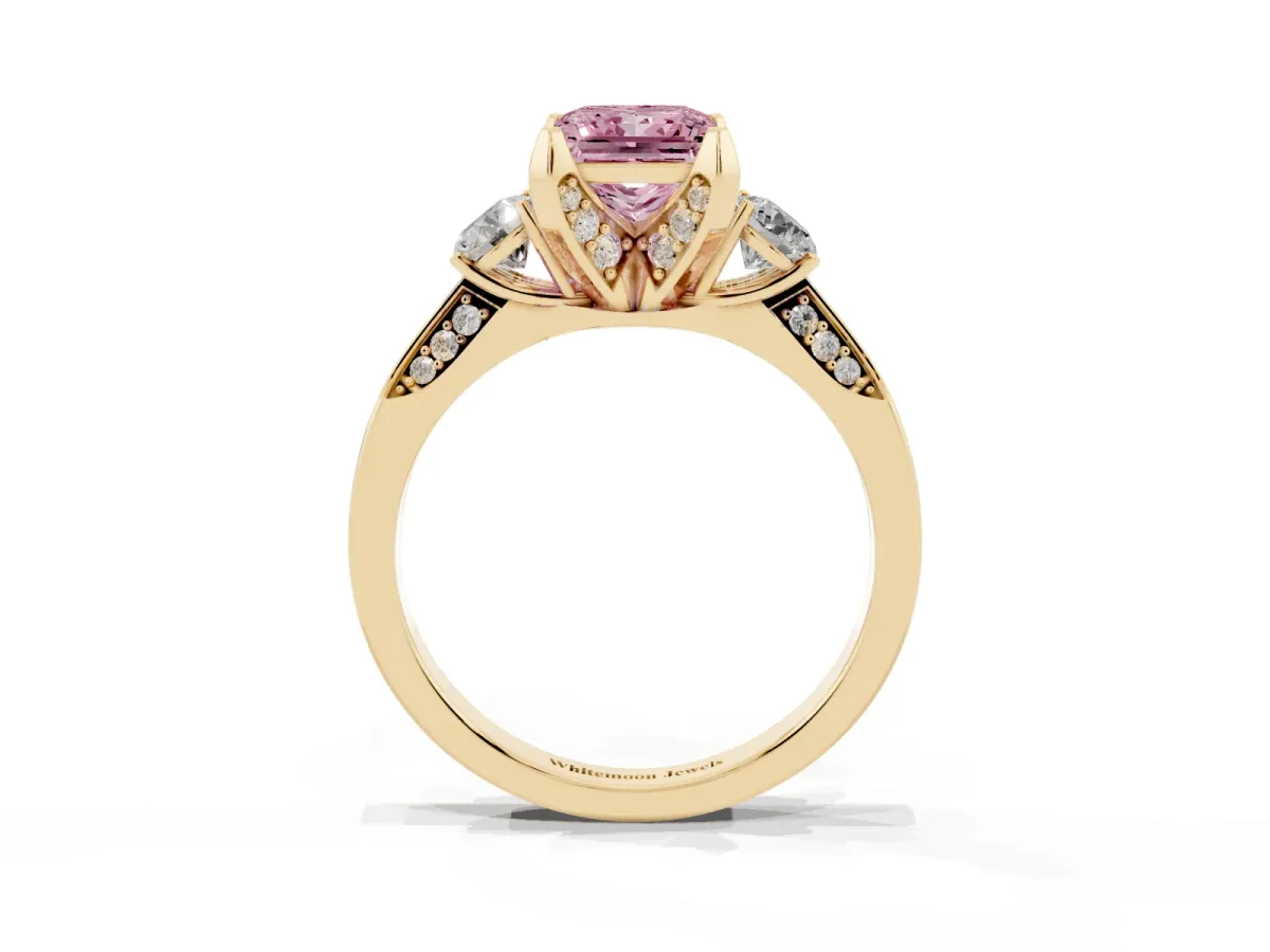 Fancy Pink Princess Cut Brilliant Three-Stone Diamond Ring with Pavé Band and Four-Prong Setting Yellow gold