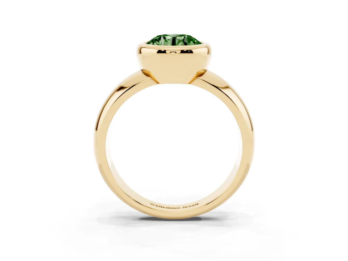 Fancy Green Bezel Set Round Cut Solitaire Ring with Wide Band Yellow gold