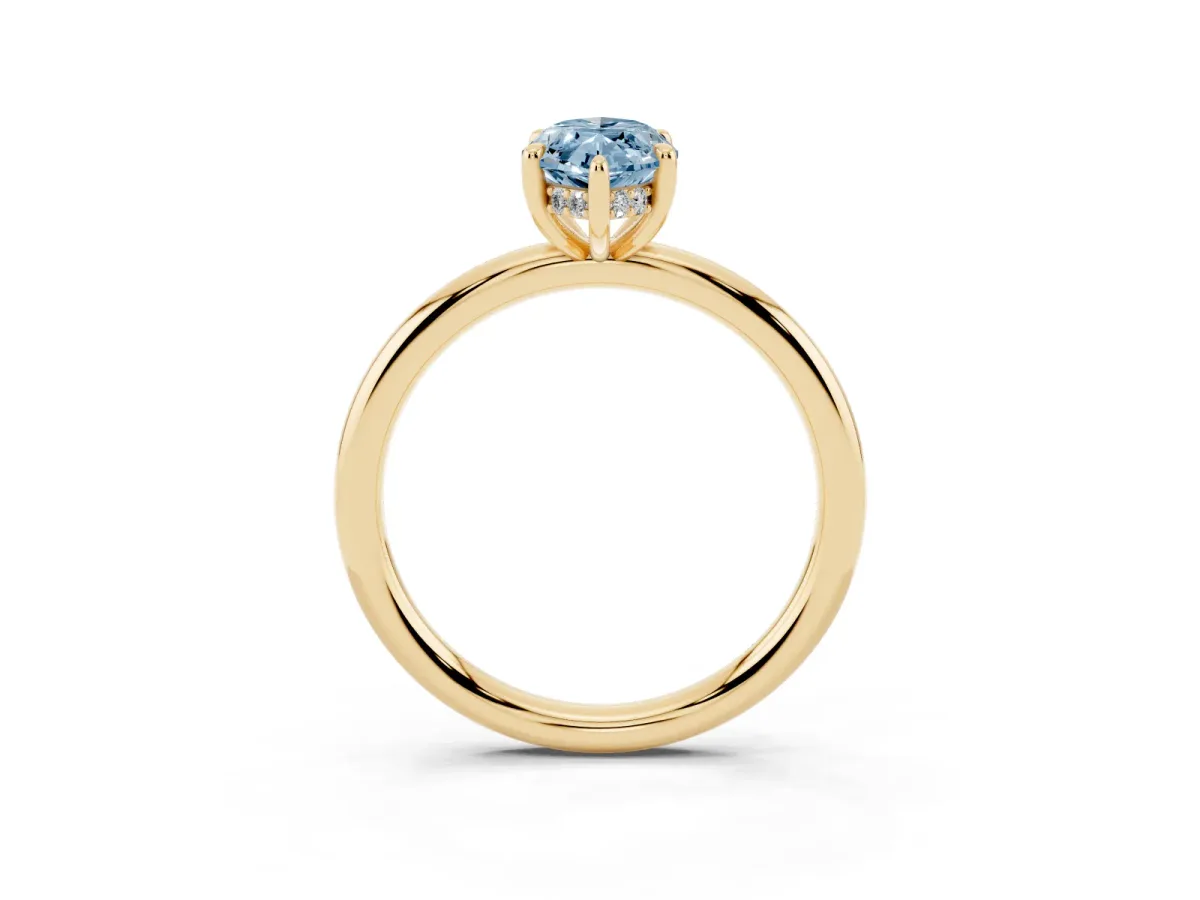 Fancy Blue Marquise Cut Diamond Solitaire Ring with Thin Band and Four-Prong Setting Yellow gold
