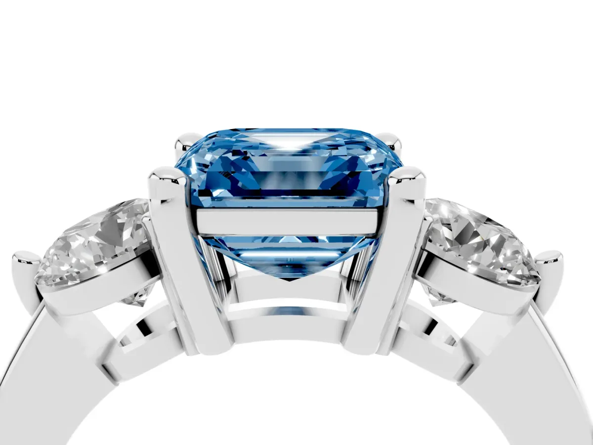 Fancy Blue Three-Stone Asscher Cut Brilliant Cut Solitaire Ring with Prong Setting on a Classic Band Platinum