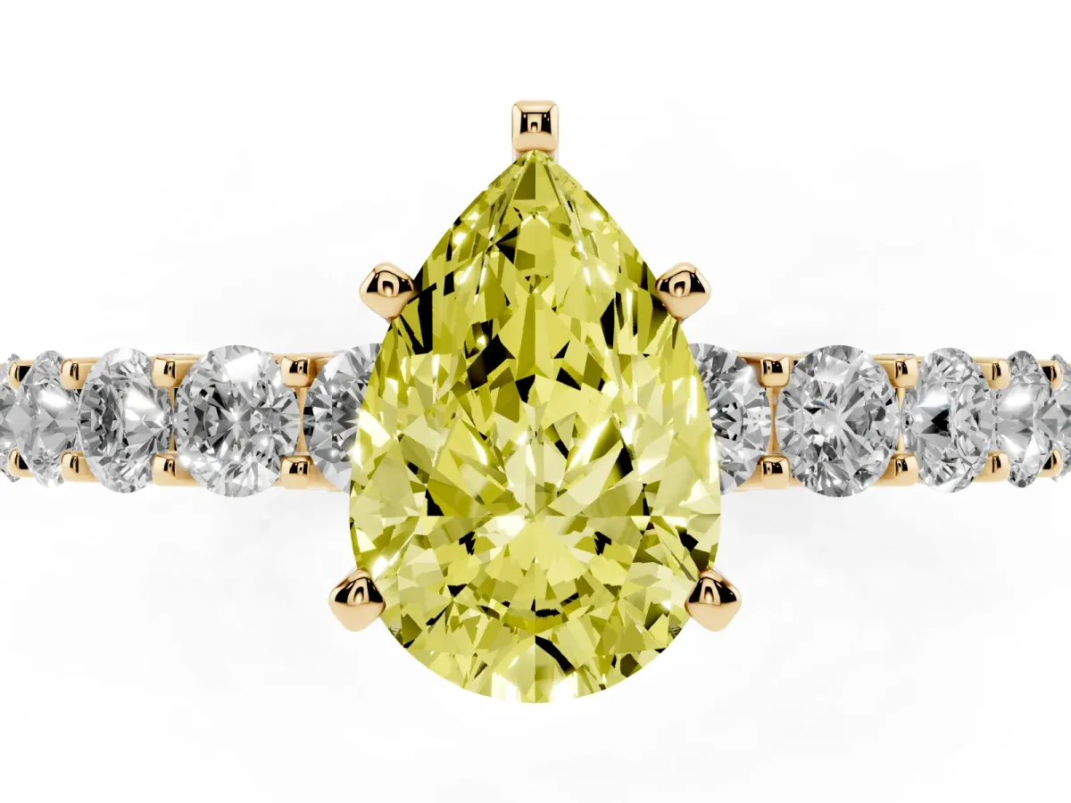 Fancy Yellow Pear Cut Diamond Solitaire Ring with Shared Prong Pavé Band and Four-Prong Setting Yellow gold