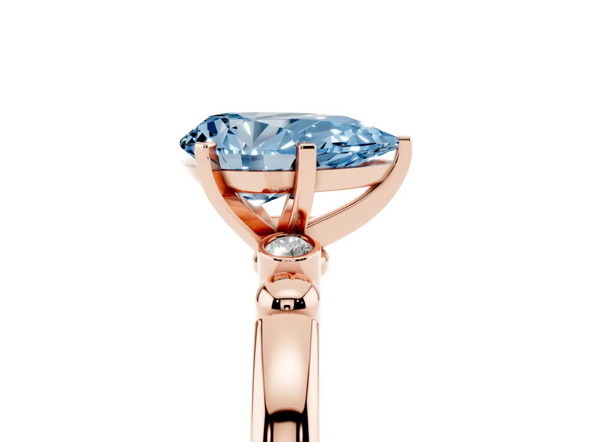 Fancy Blue Pear Cut Solitaire Beaded Band with Four-Prong Setting Rose gold