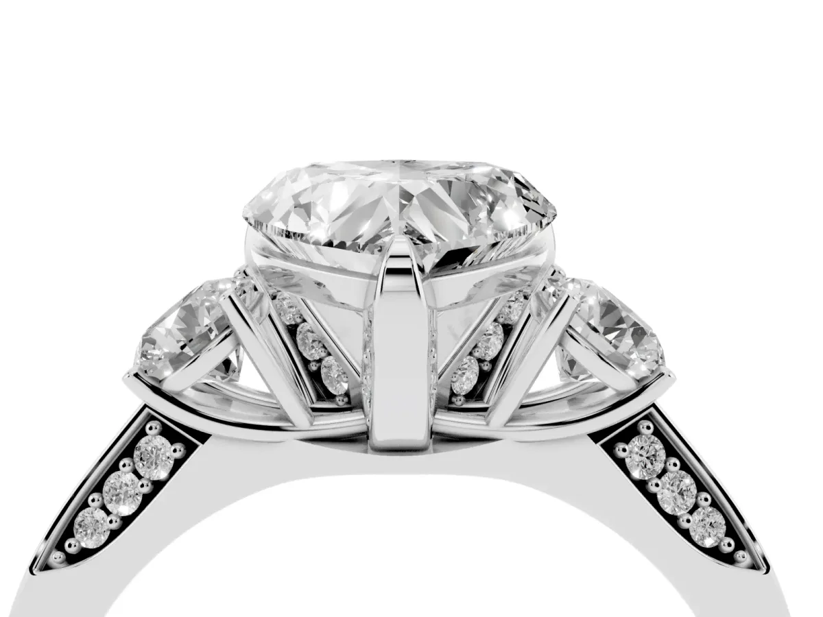 Heart Cut Brilliant Three-Stone Diamond Ring with Pavé Band and Four-Prong Setting Platinum