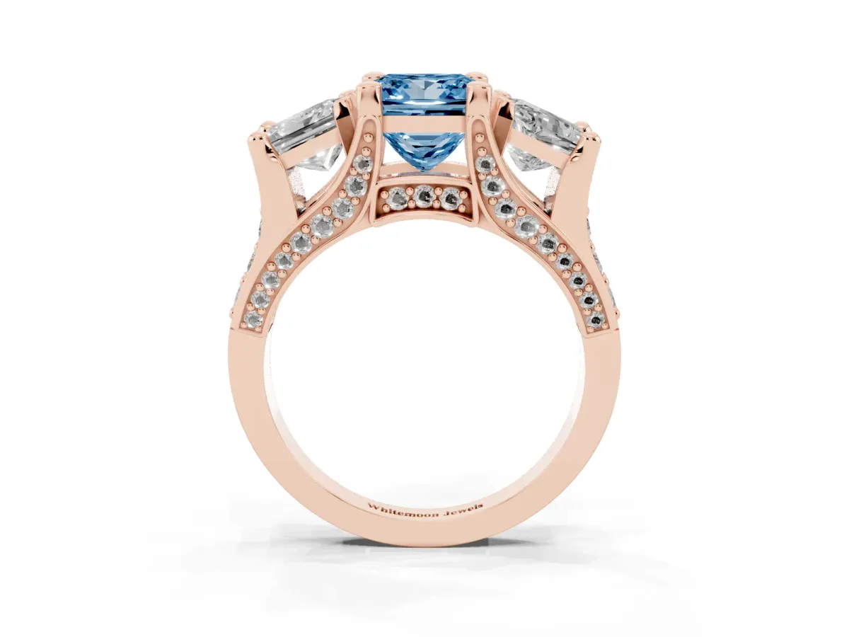 Fancy Blue Princess Cut Diamond Three-Stone Ring with Channel Set Band and Four-Prong Setting Rose gold
