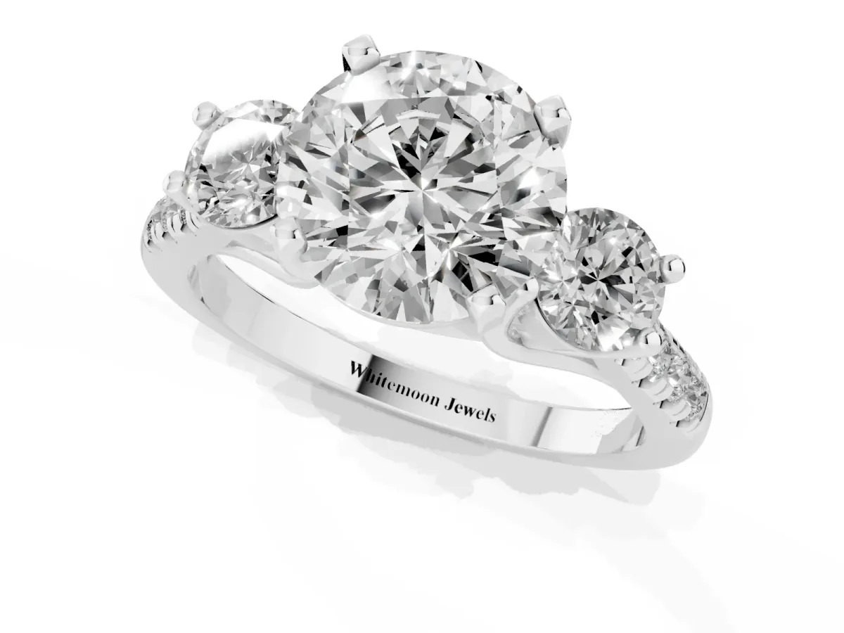Three-Stone Round Cut Diamond Pavé Band with Four-Prong Setting White gold