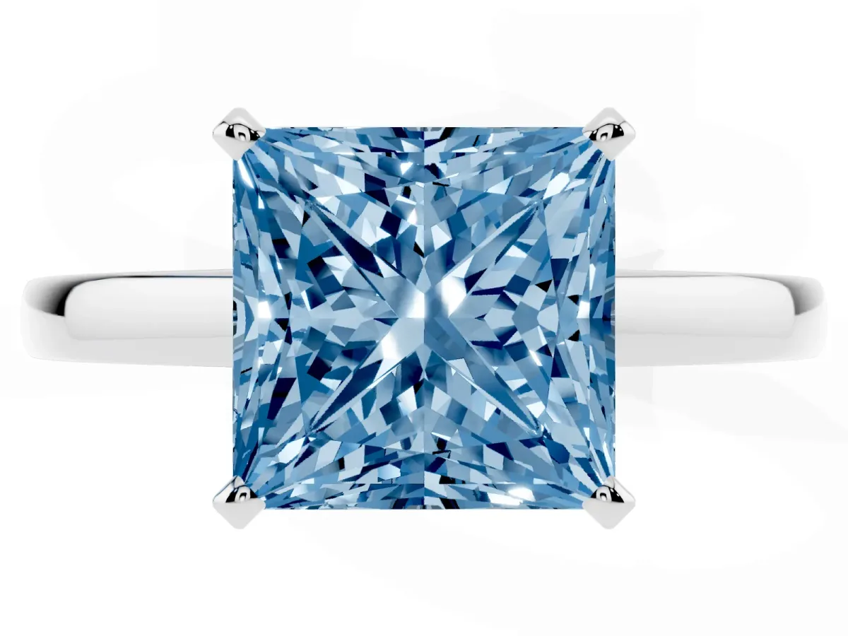 Fancy Blue Princess Cut Solitaire Diamond Engagement Ring with Four-Prong Setting on a Classic Band Silver