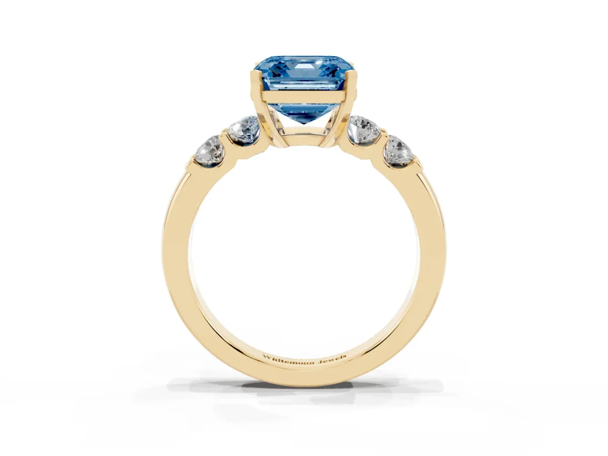 Fancy Blue Asscher Cut Brilliant Cut Diamond Five-Stone Prong Set Engagement Ring with Channel Band Yellow gold
