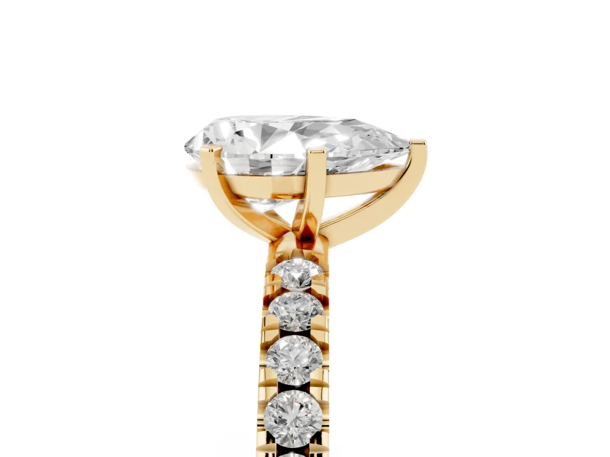 Pear Cut Diamond Pavé Band Solitaire with Four-Prong Setting Yellow gold