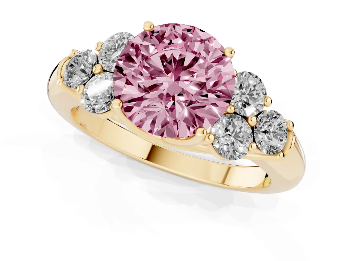Fancy Pink Round Cut Cut Diamond Cluster Ring with Round Accent Stones and Prong Setting on a Classic Band Yellow gold