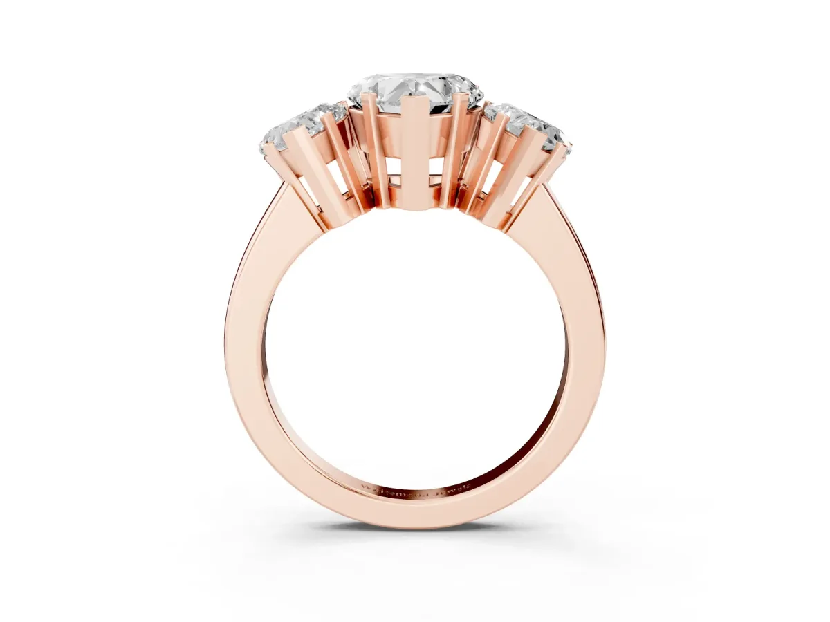 Three-Stone Heart Cut Cut Diamond Ring with Channel Set Band and Four-Prong Setting Rose gold