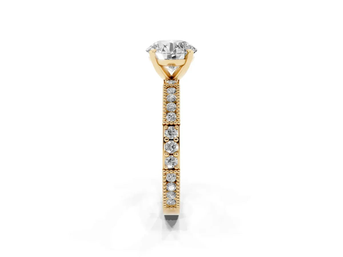 Round Cut Solitaire with Pavé Band and Four-Prong Setting Yellow gold