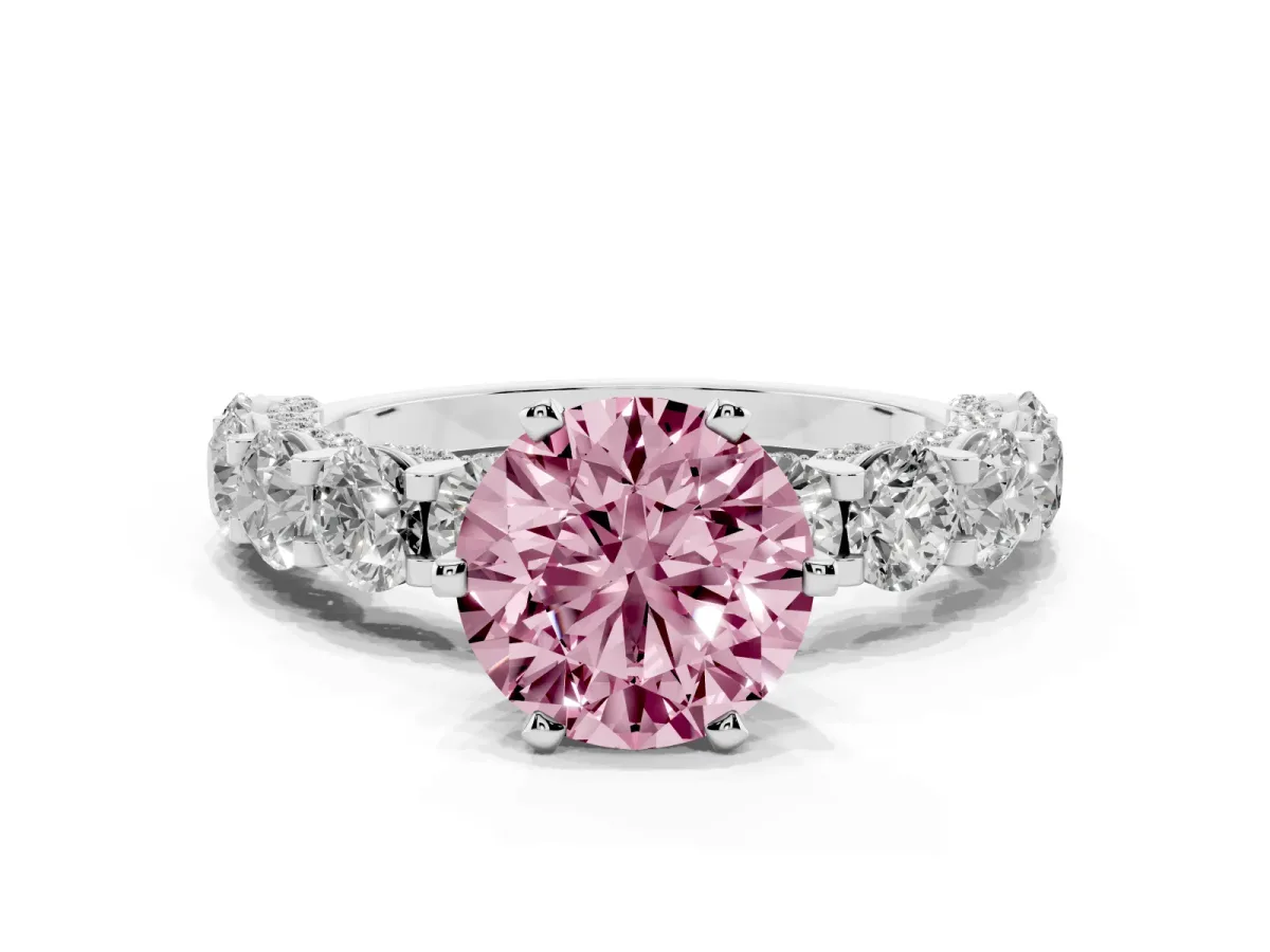 Fancy Pink Round Cut Diamond Side Stone Engagement Ring with Four-Prong Setting Silver