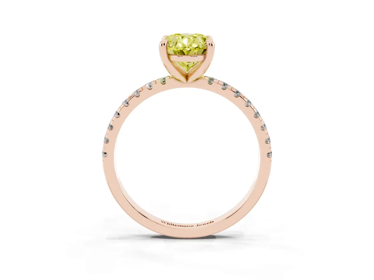 Fancy Yellow Oval Cut Diamond Brilliant Solitaire Ring with Pavé Band and Four-Prong Setting Rose gold