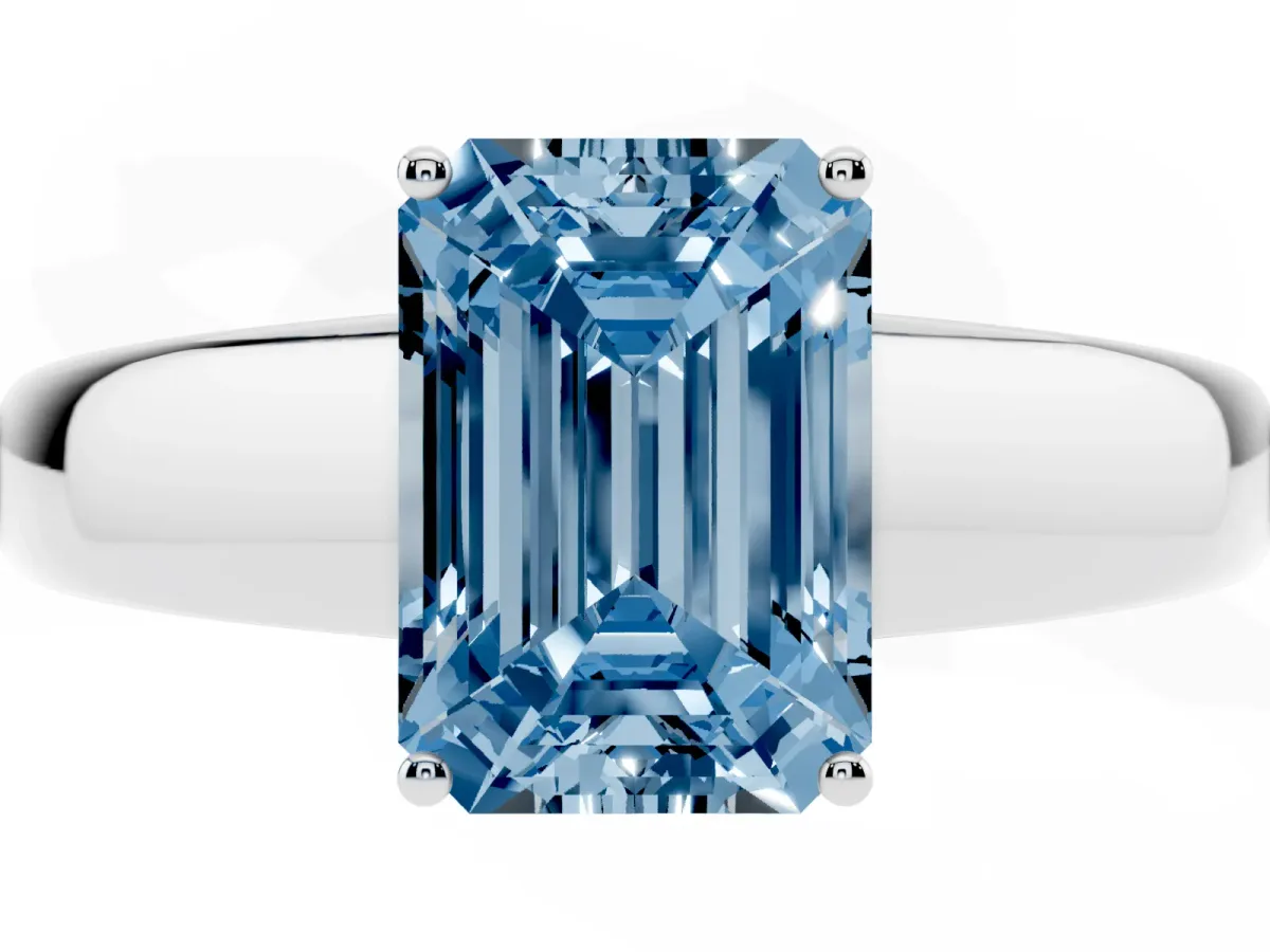 Fancy Blue Emerald Cut Solitaire Diamond Ring with Tapered Band and Four-Prong Setting Platinum