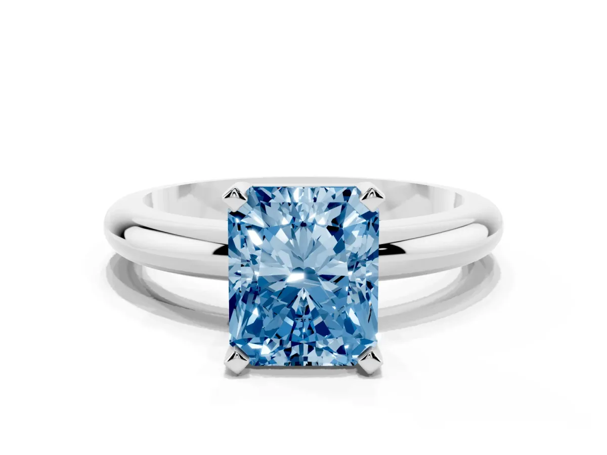 Fancy Blue Radiant Cut Diamond Solitaire Engagement Ring with Round Band and Four-Prong Setting Platinum
