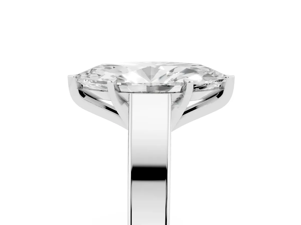 Marquise Cut Solitaire Engagement Ring with Four-Prong Setting and Tapered Band Silver