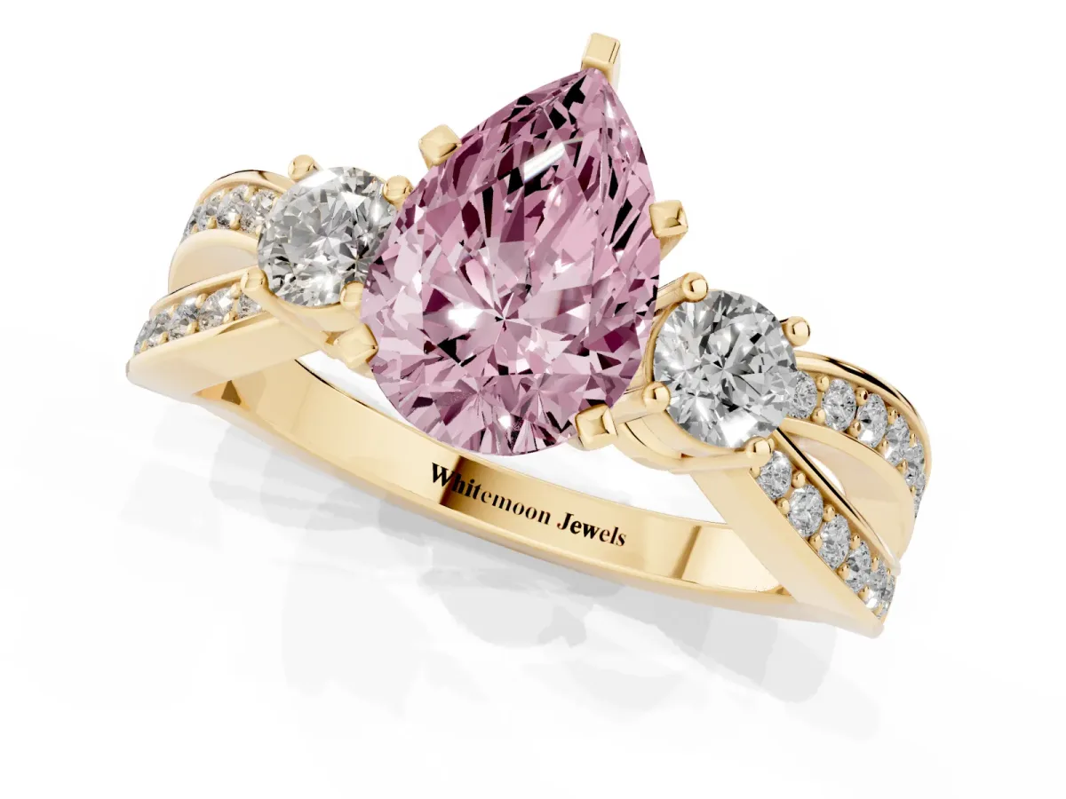Fancy Pink Three-Stone Pear Cut Cut Diamond Twist Band with Prong Setting Yellow gold