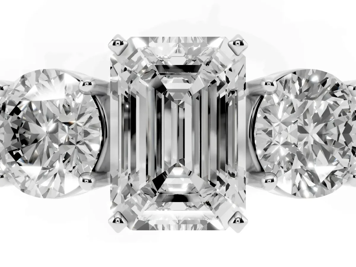Three-Stone Emerald Cut Diamond Ring with Round Side Stones, Classic Band, and Four-Prong Setting Silver