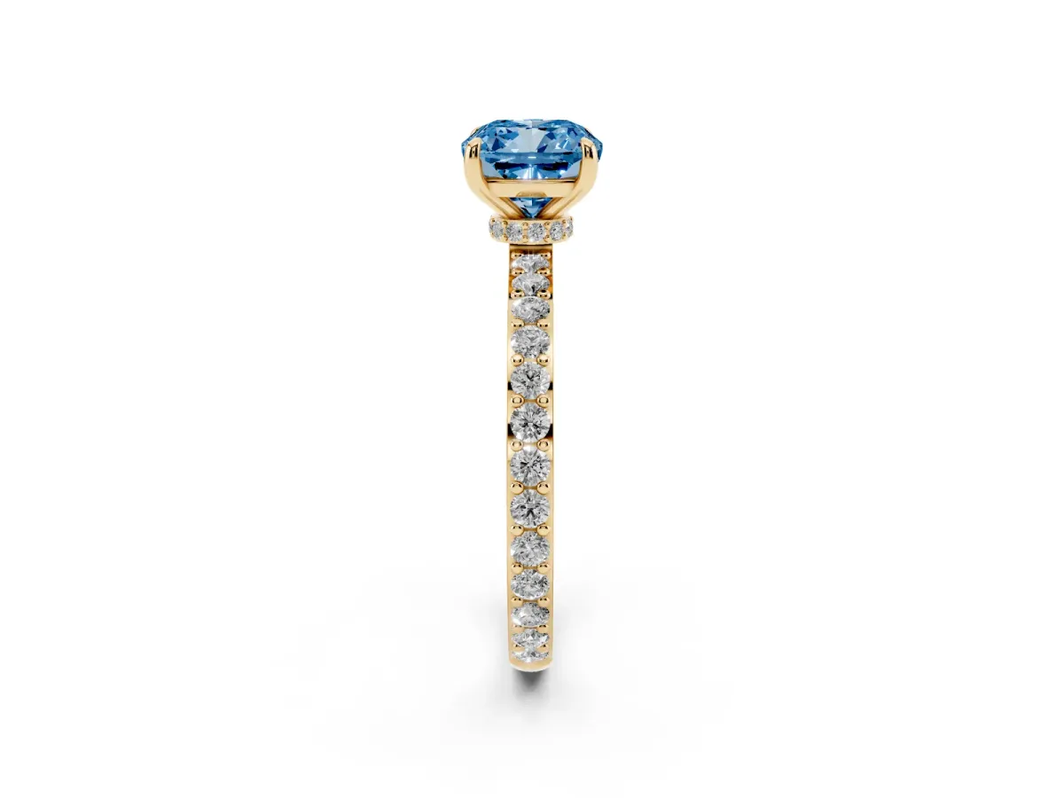 Fancy Blue Cushion Cut Diamond Solitaire Engagement Ring with Pavé Band and Four-Prong Setting Yellow gold