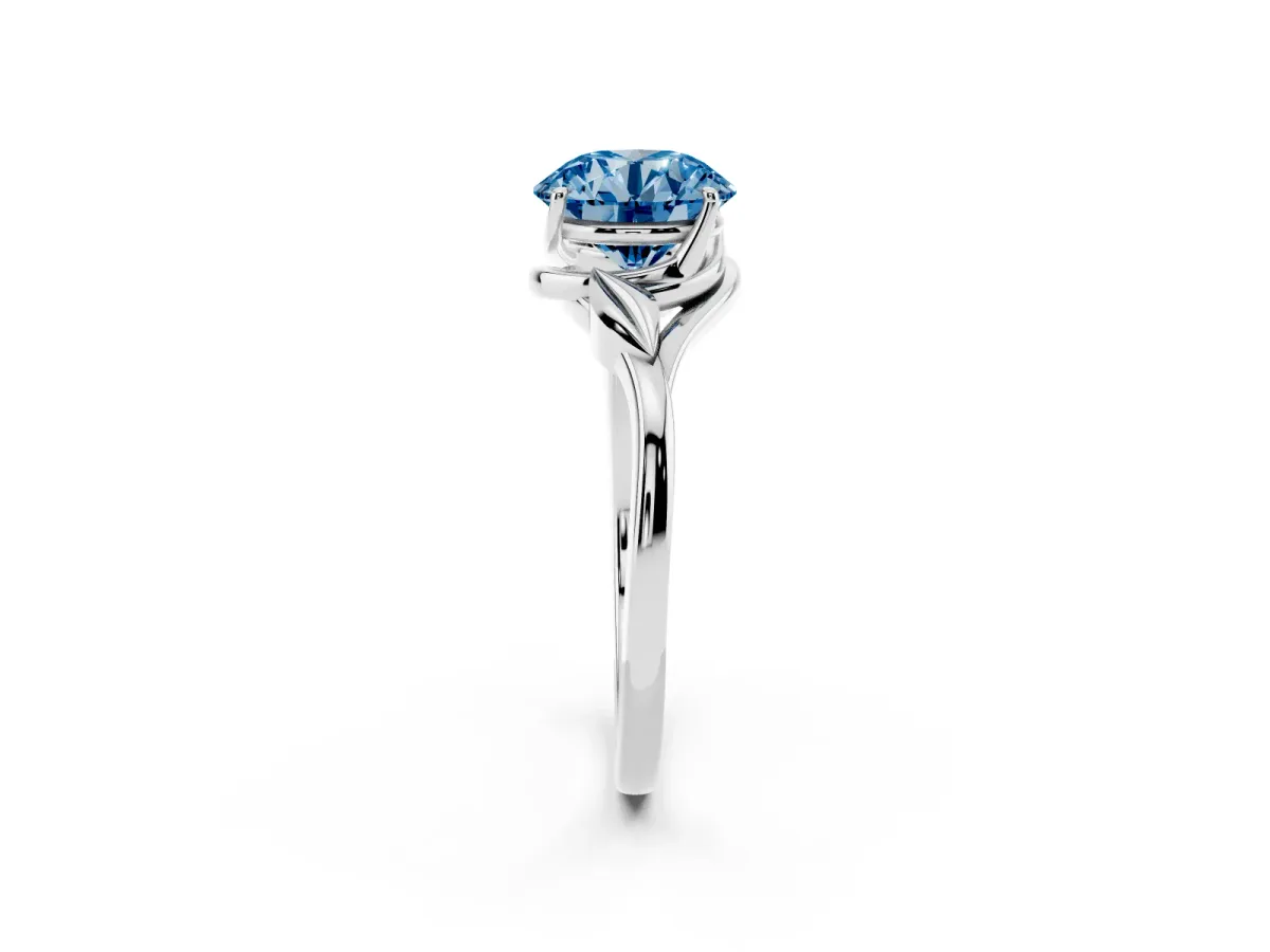 Fancy Blue Round Cut Diamond Solitaire Ring with Twist Band and Four-Prong Setting Silver