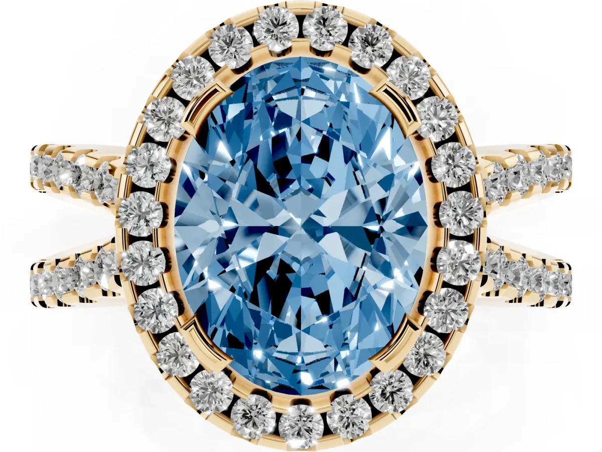 Fancy Blue Oval Cut Diamond Halo Ring with Split Shank Pavé Band and Prong Setting Yellow gold
