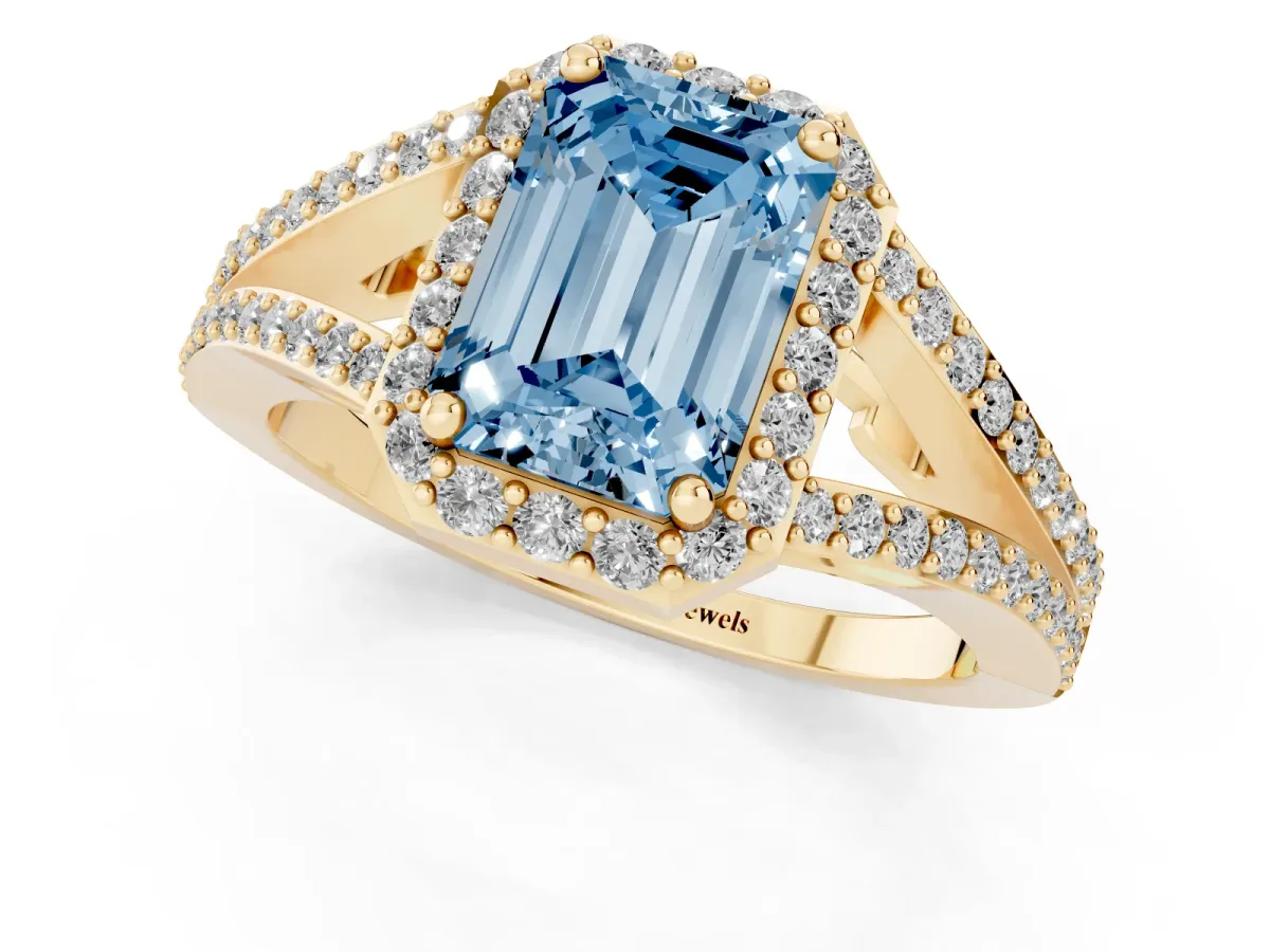 Fancy Blue Emerald Cut Halo Split Shank Pave Diamond Ring with Four-Prong Setting Yellow gold