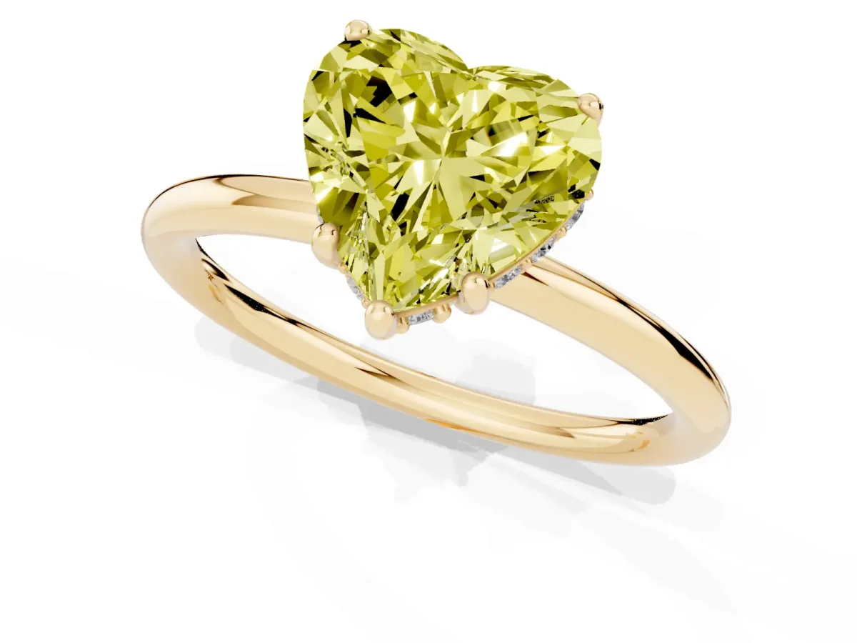 Fancy Yellow Heart Cut Solitaire Diamond Ring with a Classic Band and Four-Prong Setting Yellow gold