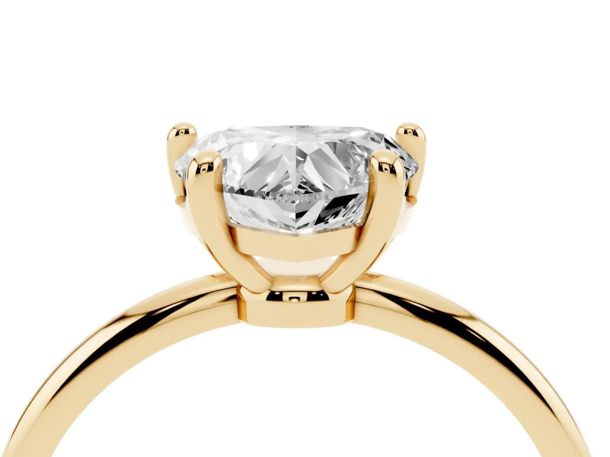 Heart Cut Solitaire Diamond Ring with 4-Prong Setting on a Classic Band Yellow gold