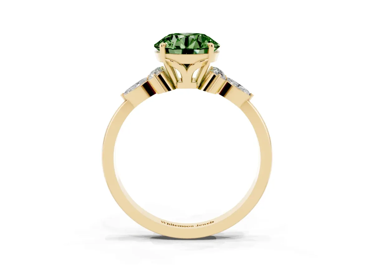 Fancy Green Round Cut Brilliant Diamond Solitaire Ring with Pear Side Stones and Four-Prong Setting Yellow gold