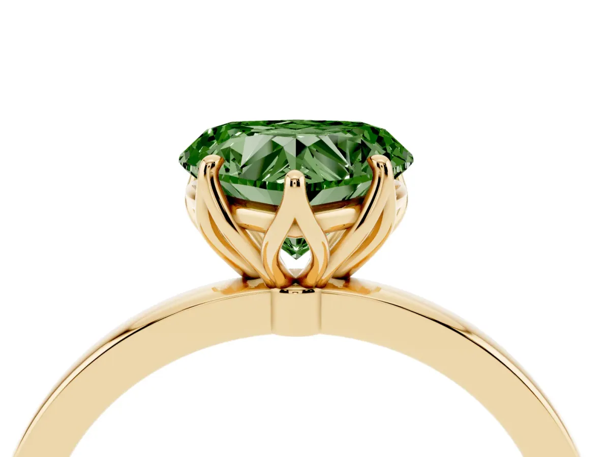 Fancy Green Heart Cut Diamond Solitaire Ring with Thin Band and Prong Setting Yellow gold