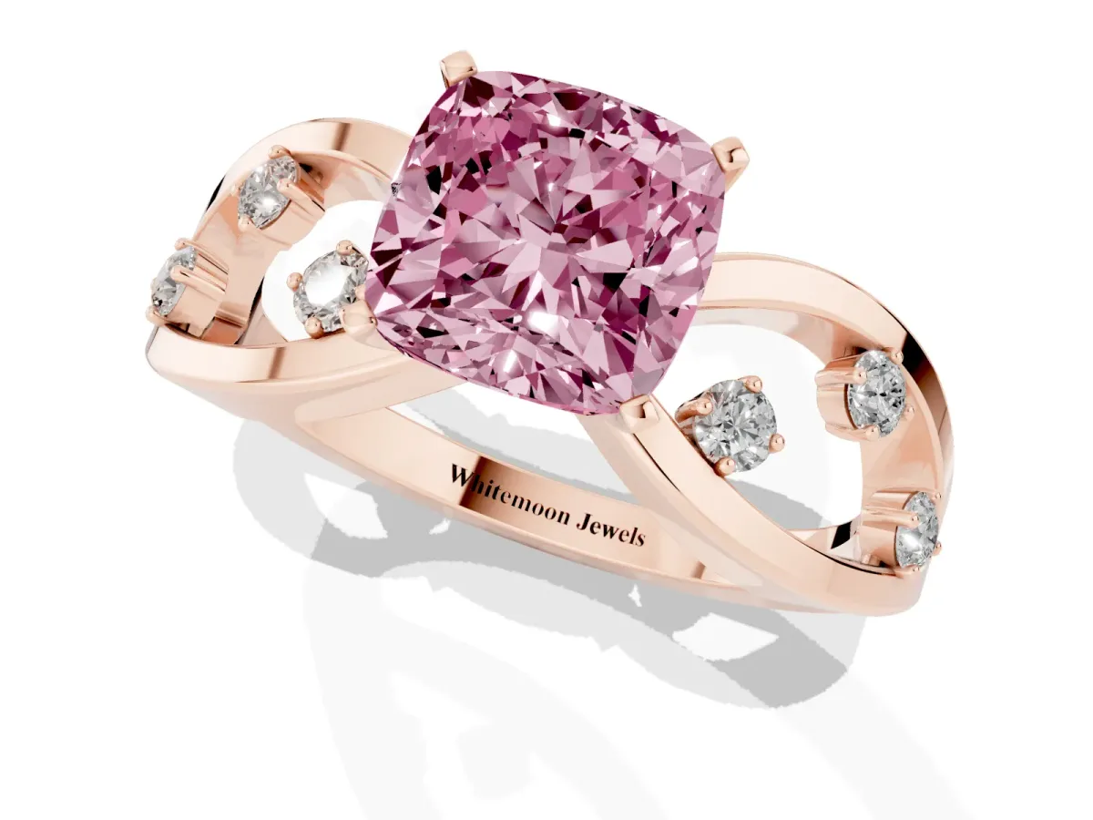 Fancy Pink Cushion Cut Cut Solitaire Diamond with Side Stones on Criss-Cross Band and Four-Prong Setting Rose gold