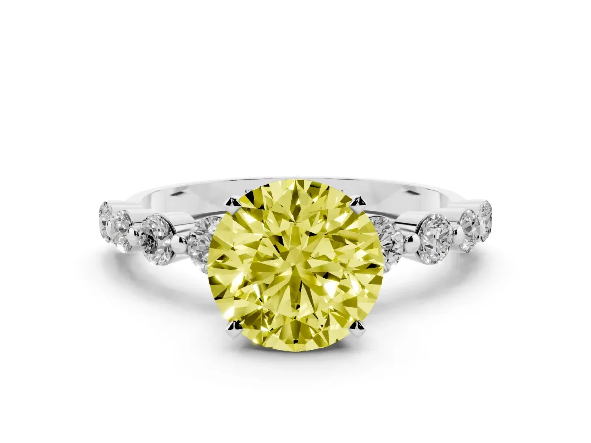 Fancy Yellow Round Cut Solitaire Diamond Ring with Pave Band and Four-Prong Setting Silver