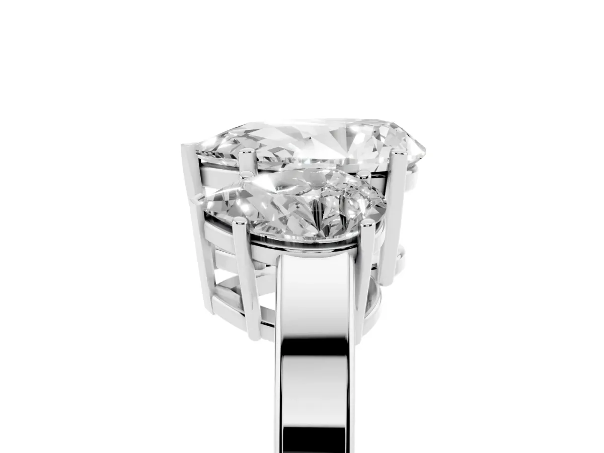 Three-Stone Pear Cut Cut Diamond Engagement Ring with Flat Band and Four-Prong Setting Silver