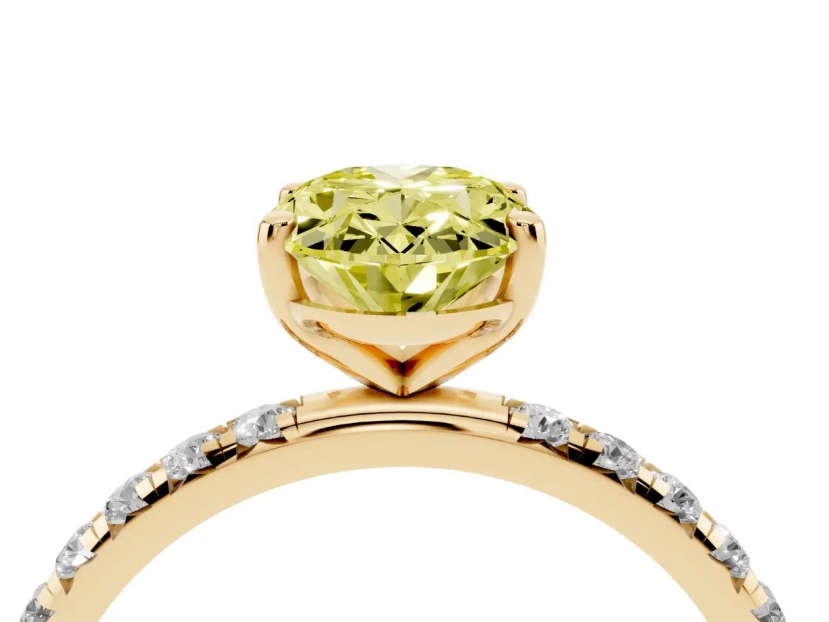 Fancy Yellow Oval Cut Cut Diamond Solitaire Ring with Micro Pave Band and Four Prong Setting Yellow gold