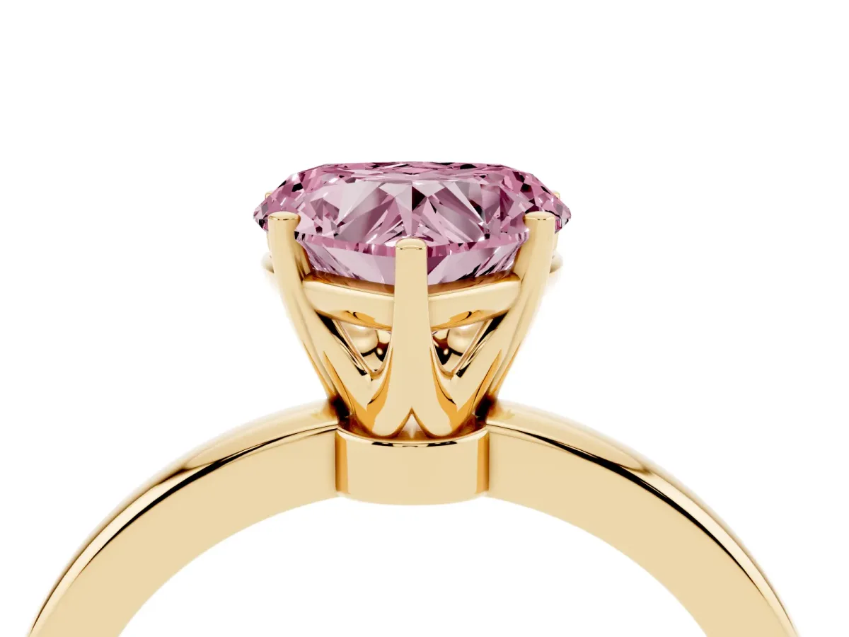 Fancy Pink Heart Cut Solitaire Diamond Ring with Six-Prong Setting on a Classic Band Yellow gold