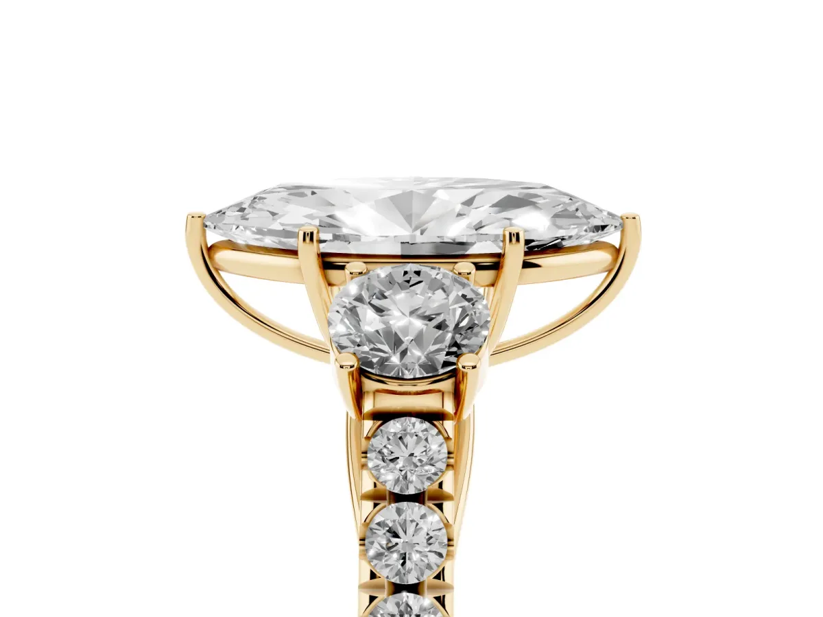 Marquise Cut Cut Diamond Three-Stone Ring with Round Side Stones and Pavé Band Yellow gold