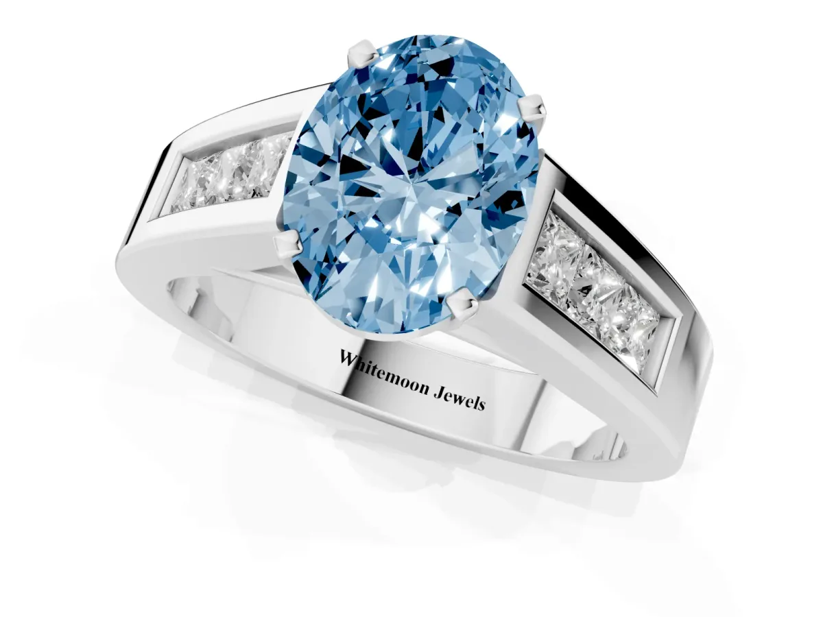 Fancy Blue Oval Cut Cut Channel Set Solitaire Ring with Four-Prong Setting White gold
