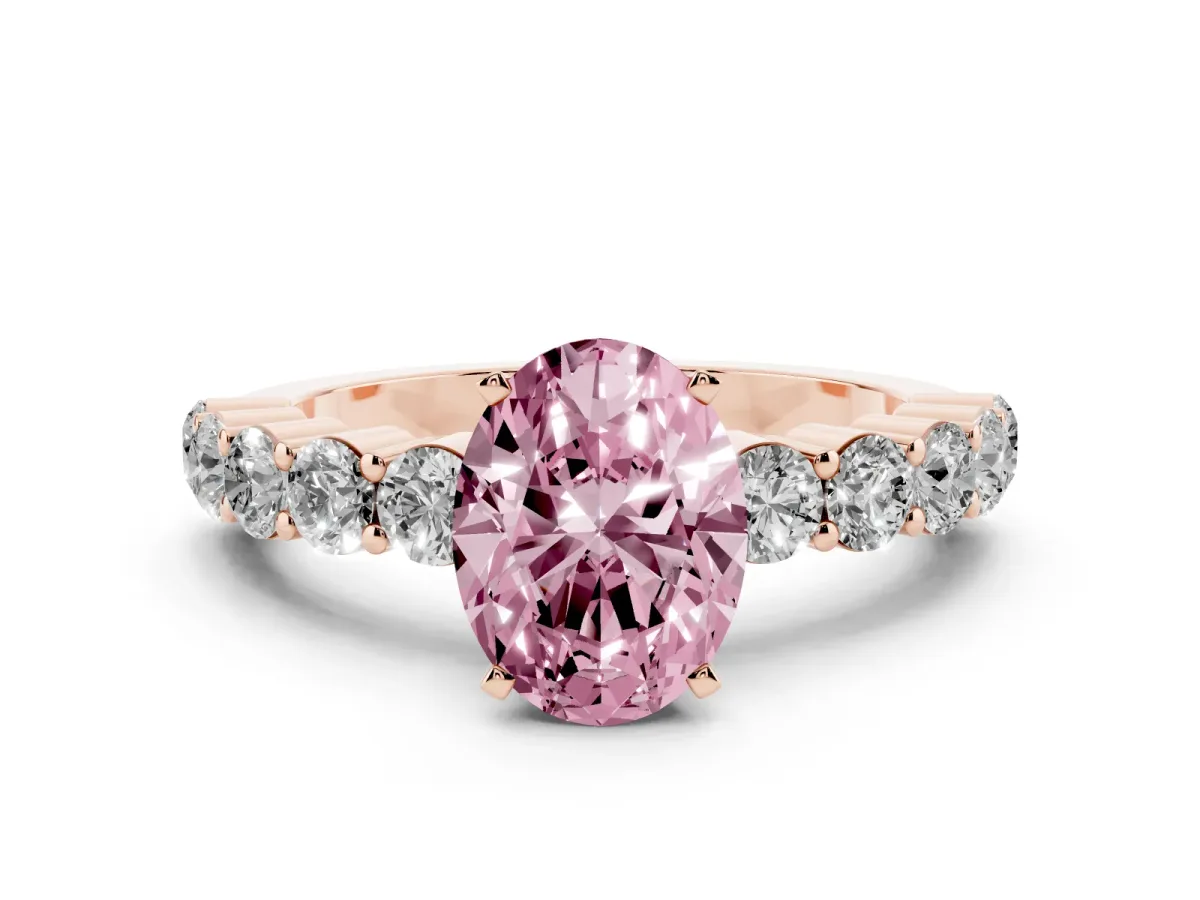 Fancy Pink Oval Cut Diamond Solitaire Ring with Shared Prong Round Side Stones Rose gold