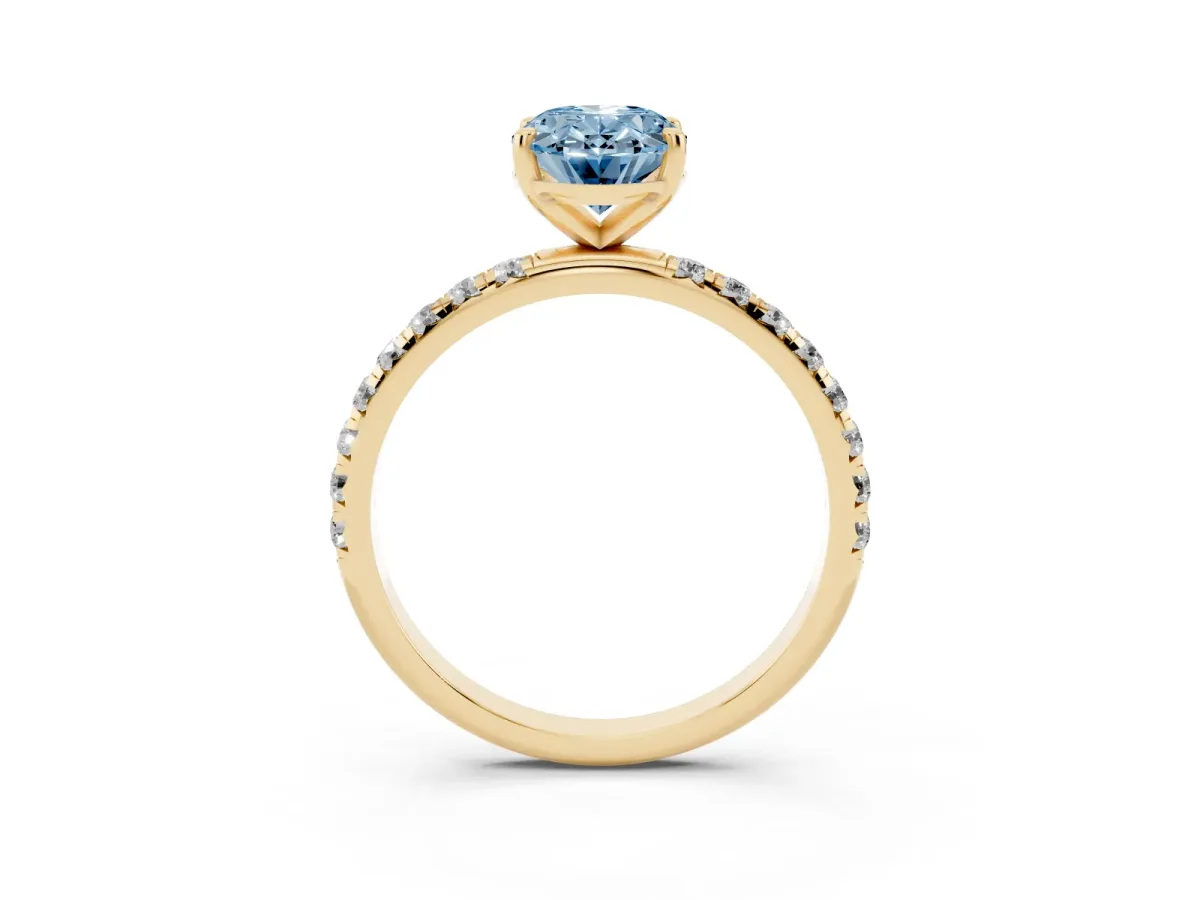 Fancy Blue Oval Cut Cut Diamond Solitaire Ring with Micro Pave Band and Four Prong Setting Yellow gold